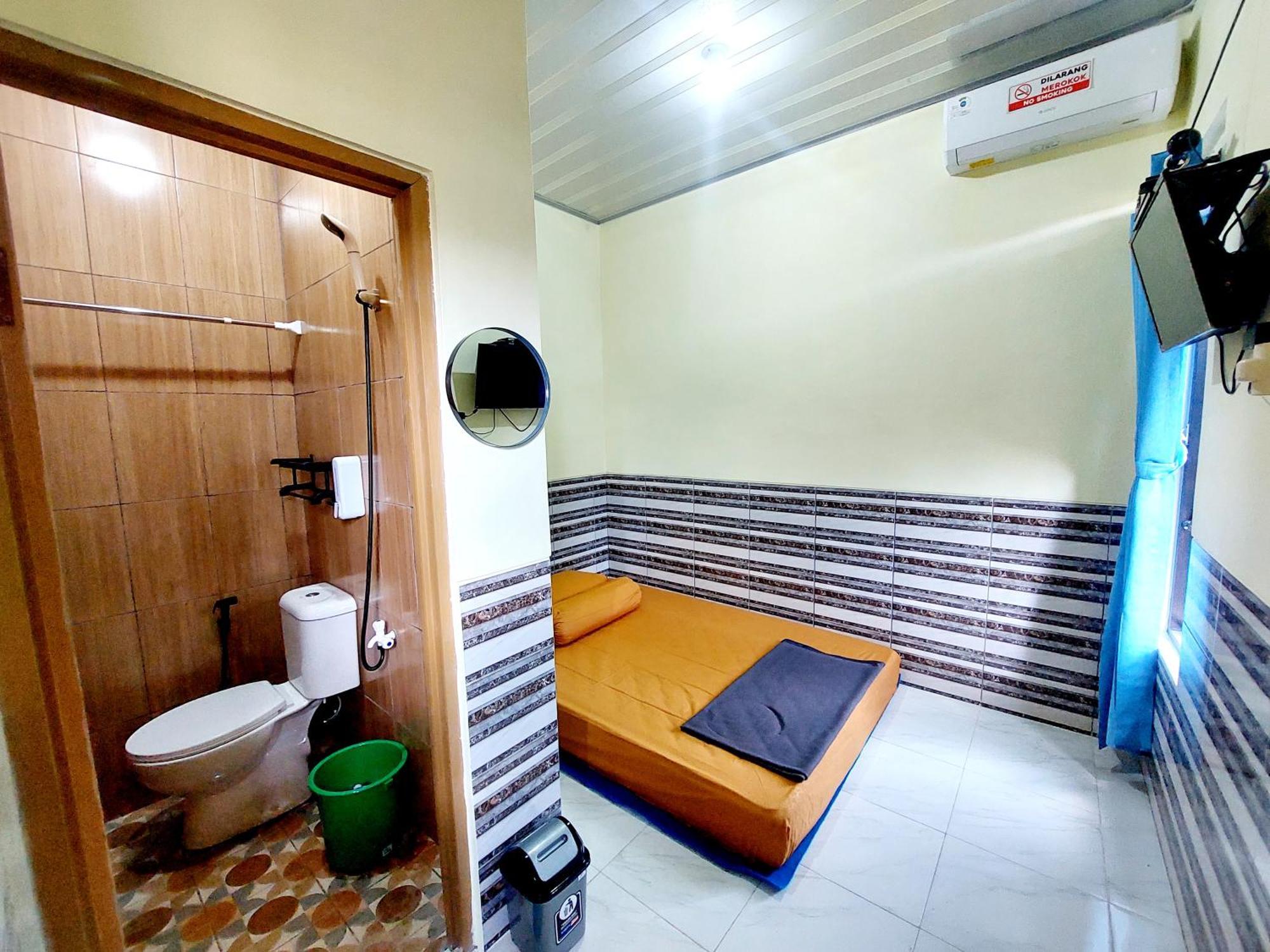 Griya Tugu Jogja Syariah Hotel Yogyakarta Værelse billede